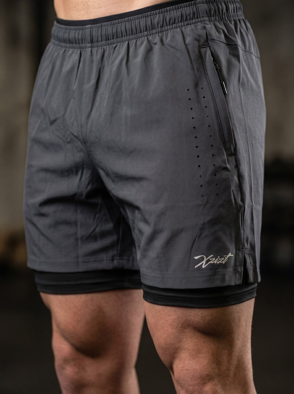 XZIZT gym shorts in dark grey, model posing #Color_Grey